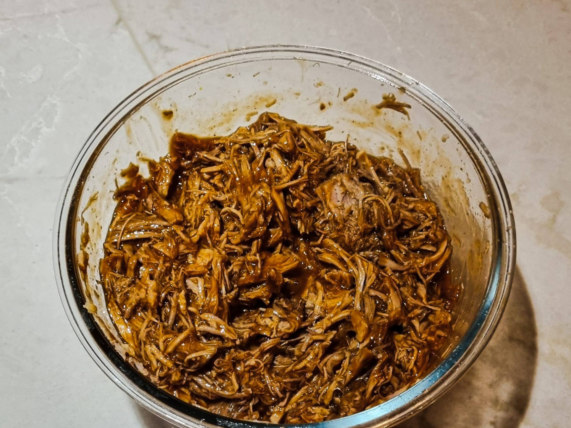 A plate of tender, shredded BBQ pulled pork