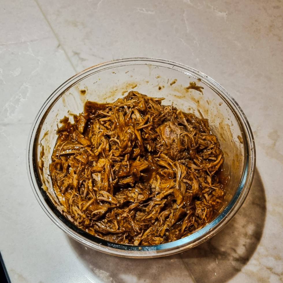 A plate of tender, shredded BBQ pulled pork