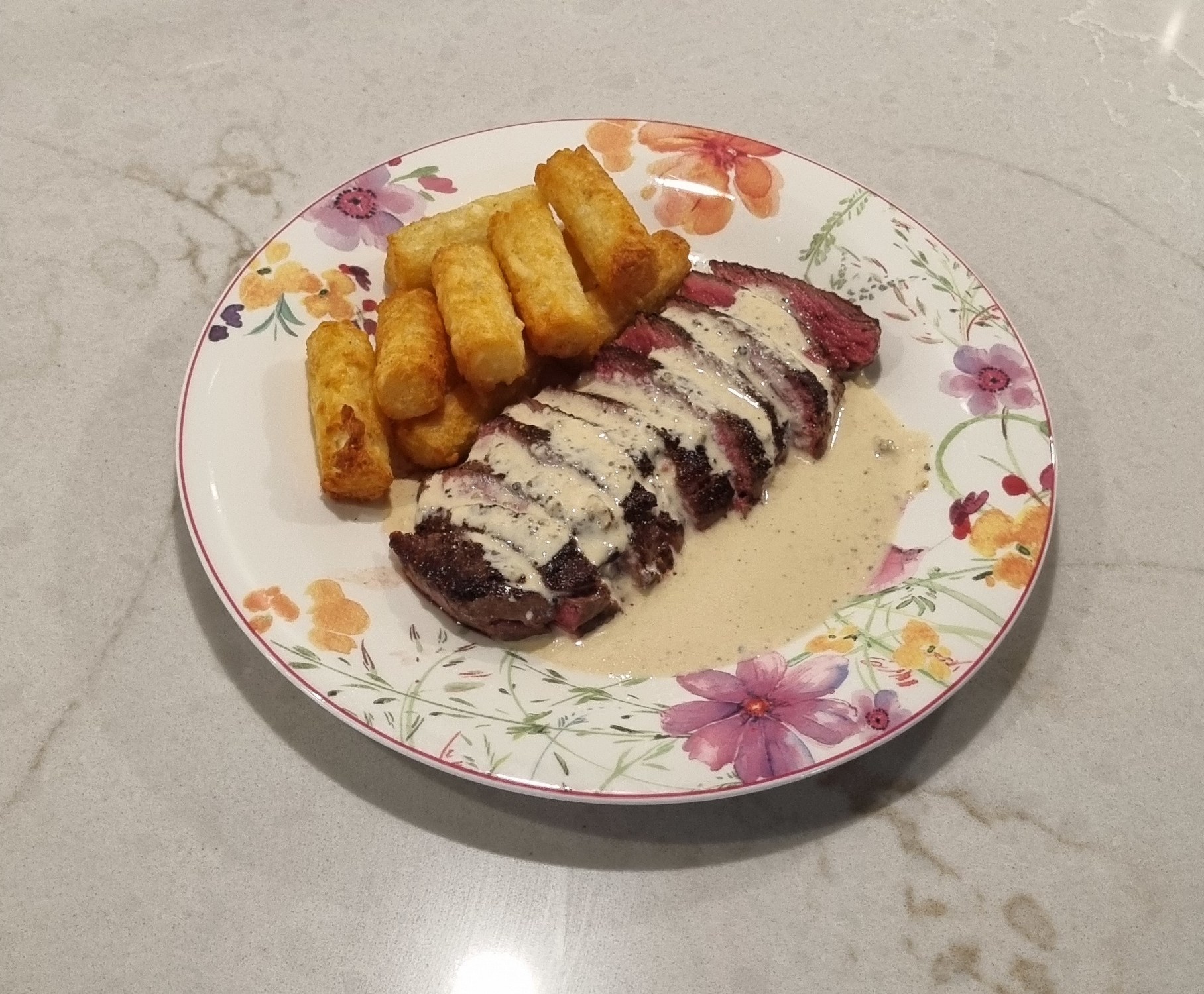 Pepper and cheddar sauce on steack